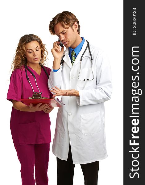 Nurse and Doctor looking at chart with bad news