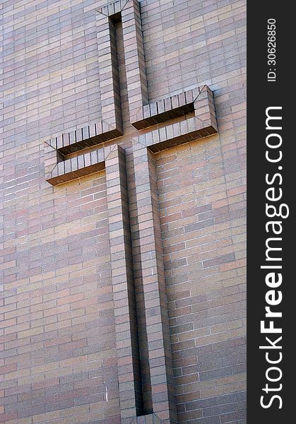 Brick Cross on a outdoor Brick Wall. Brick Cross on a outdoor Brick Wall