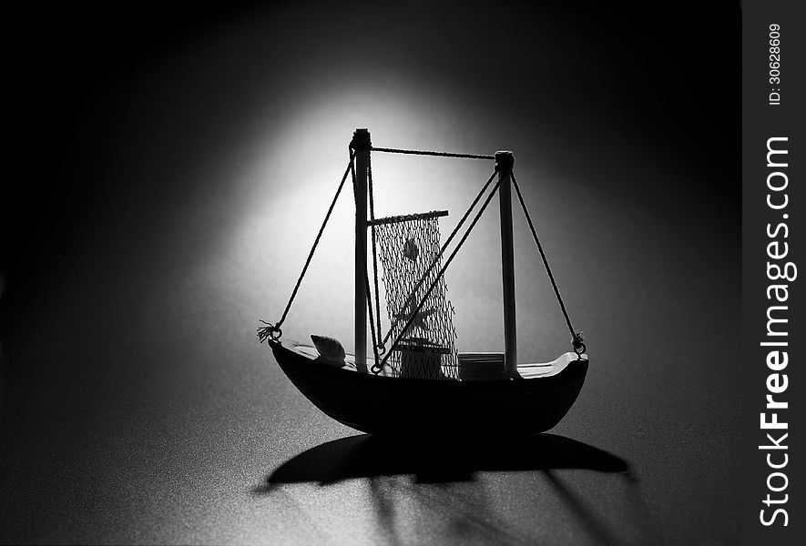 Abstract boat on dark background close up