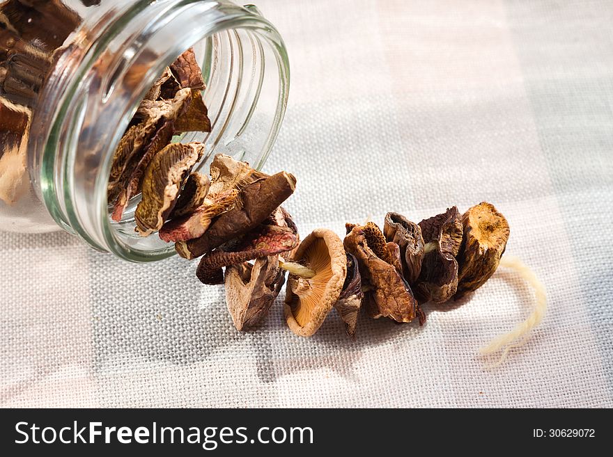 Dried mushrooms in a glass jar