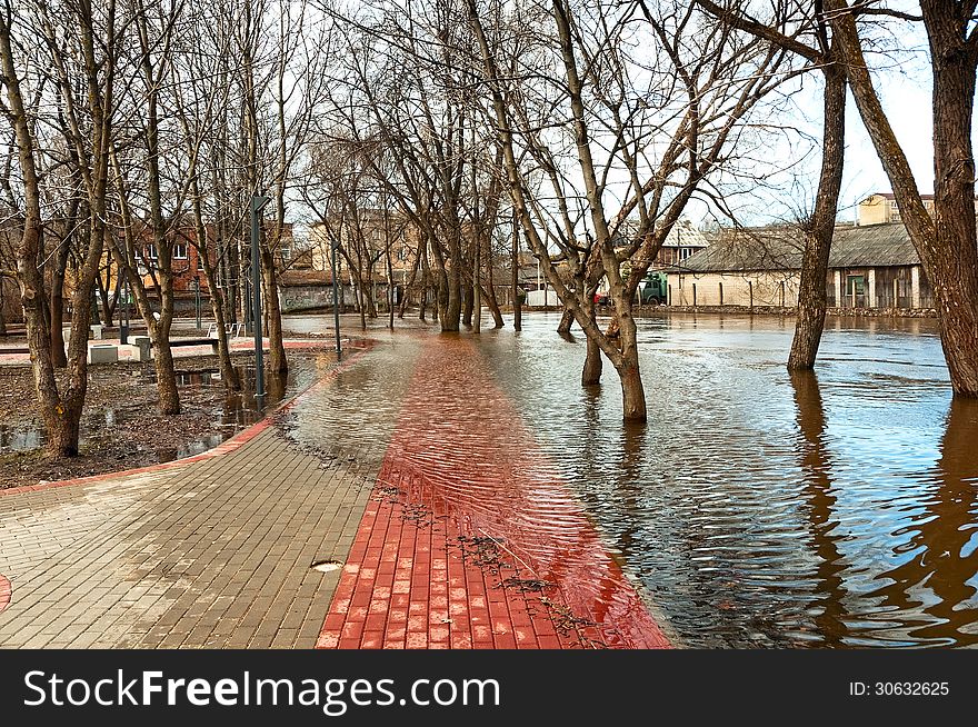 Flooding rivers flooded city park