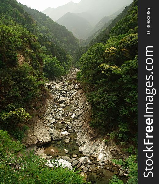 River in Japanese mountains flowing through rocks. River in Japanese mountains flowing through rocks