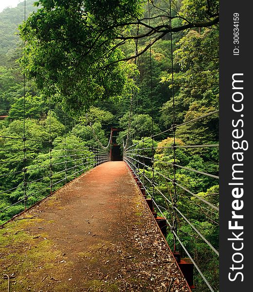 Red bridge in the mountains in Japan. Red bridge in the mountains in Japan