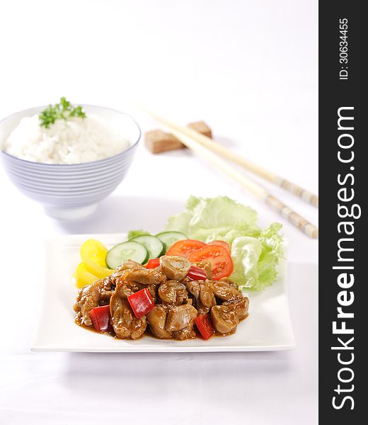 Delicious and tasty oriental cuisine with chicken and mushroom. Delicious and tasty oriental cuisine with chicken and mushroom