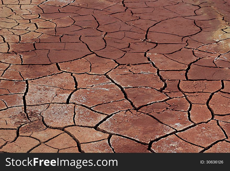 Red Cracked surface near the alumina plant. Red Cracked surface near the alumina plant