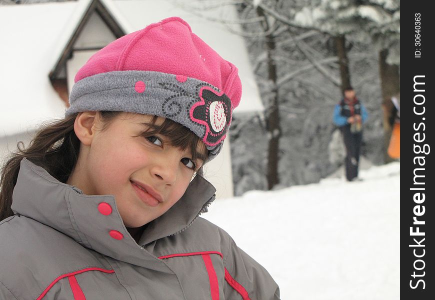 Portrait of cute little girl in warm ski suit. Portrait of cute little girl in warm ski suit