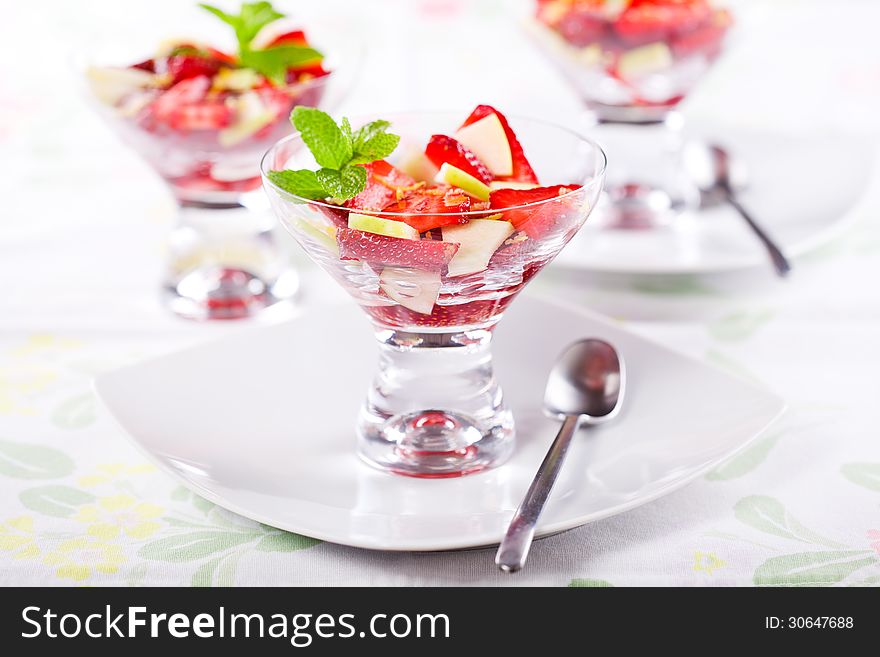 Close up photograph of a bowl of fresh fruit salad