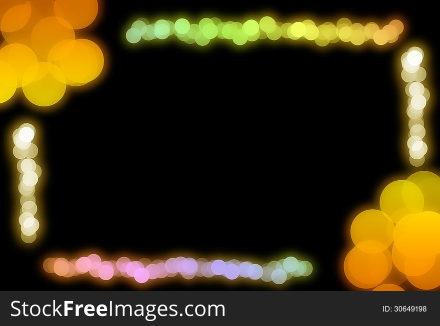 Abstract glowing bokeh light frame on black background. Abstract glowing bokeh light frame on black background