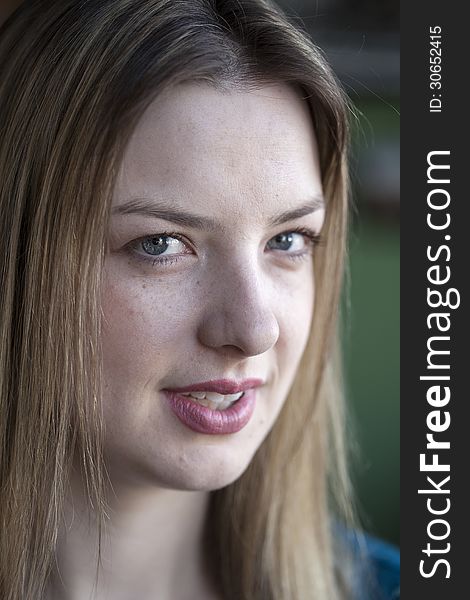 Portrait of a blonde woman with blue eyes. Portrait of a blonde woman with blue eyes.