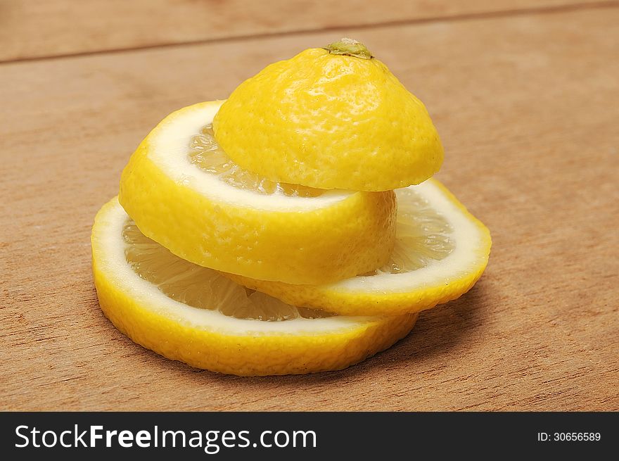 Lemon fruit shot with wooden texture background