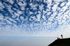White Fluffy Clouds In The Blue Sky Stock Photo White Fluffy Clouds In The Blue Sky Stock Photo