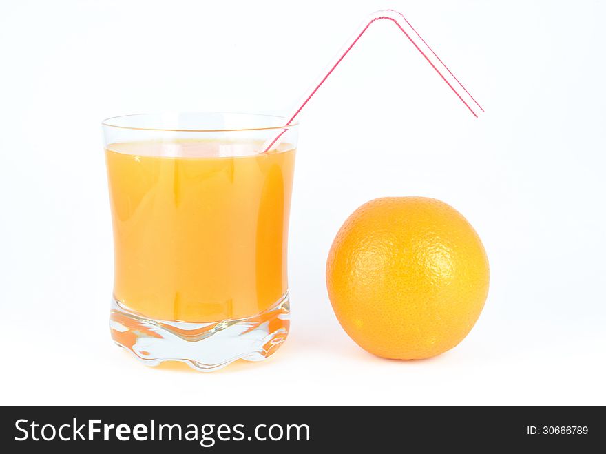 Orange juice and oranges on a white background