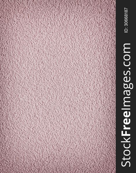 Textured violet colored stucco wall with room for text. Textured violet colored stucco wall with room for text