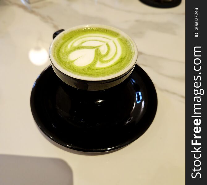 a cup of green tea matcha latte