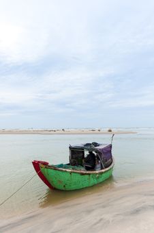 Fishing Boat At The Shore-line Stock Photos Fishing Boat At The Shore-line Stock Photos
