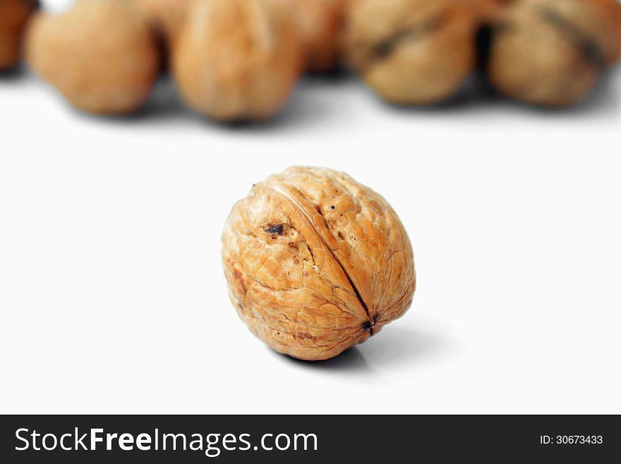 Walnuts on a white background (diet food)
