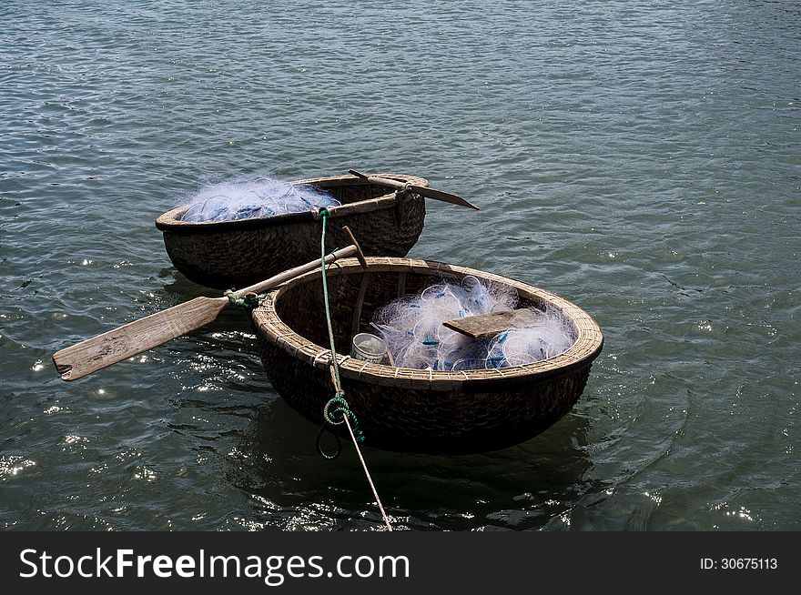 Coracles with fishing nets floating on the water at Binh thuan, Vietnam