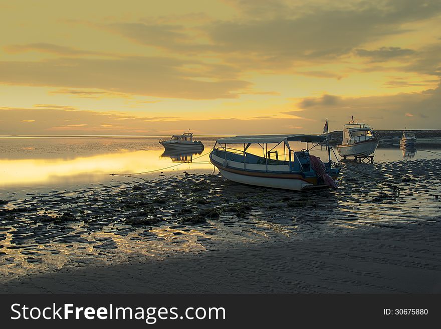 Motorboats On The Beach Of Nusa Dua At Sunrise