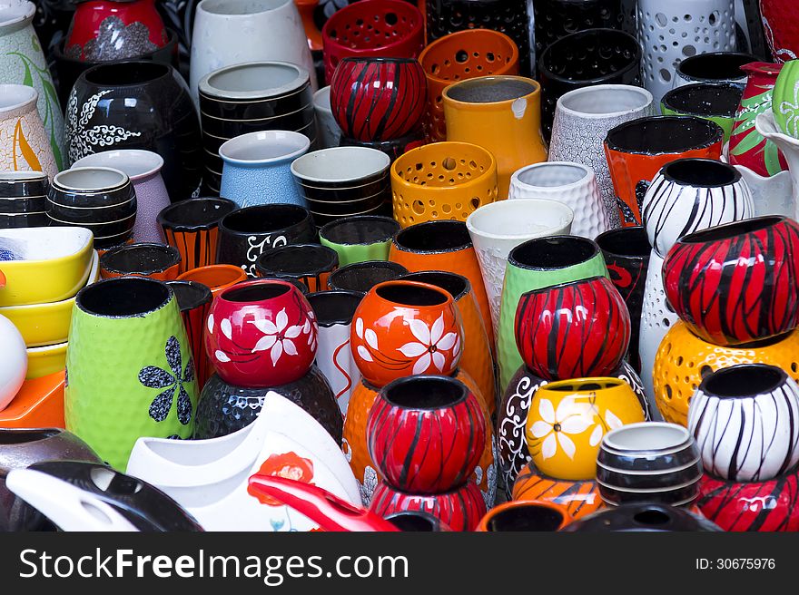 Colorful ceramic jar and bowl at shop