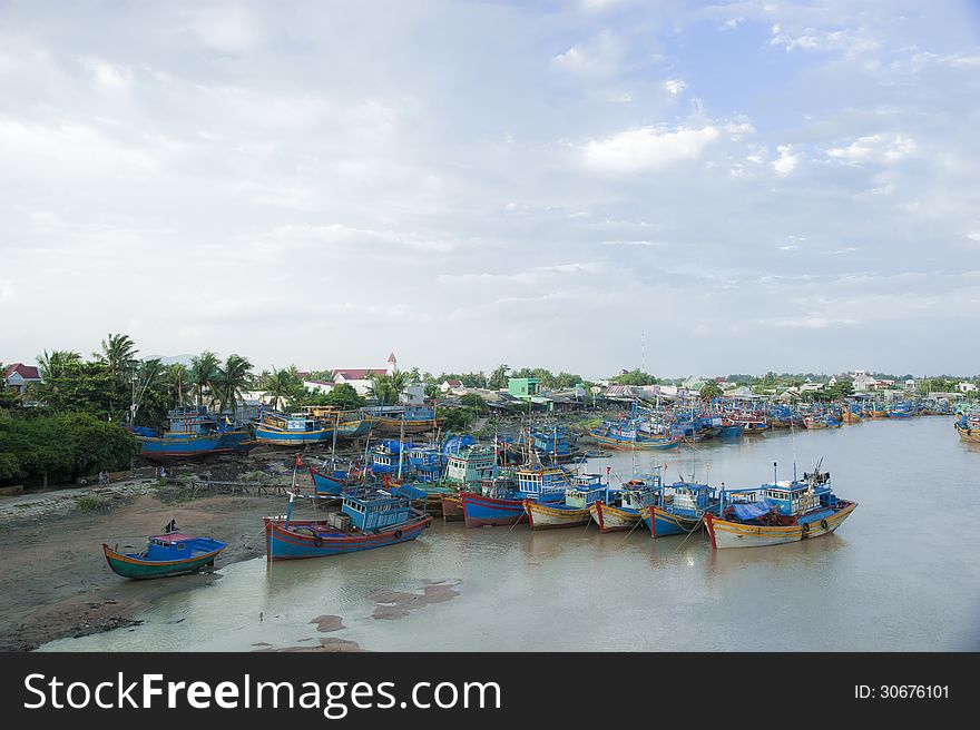 Fishing boats docked at harbor