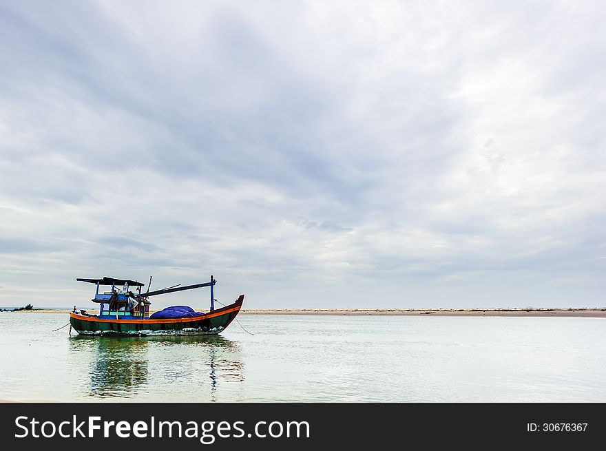 The fishing boats anchored near the seaside at Binh Thuan province, Vietnam