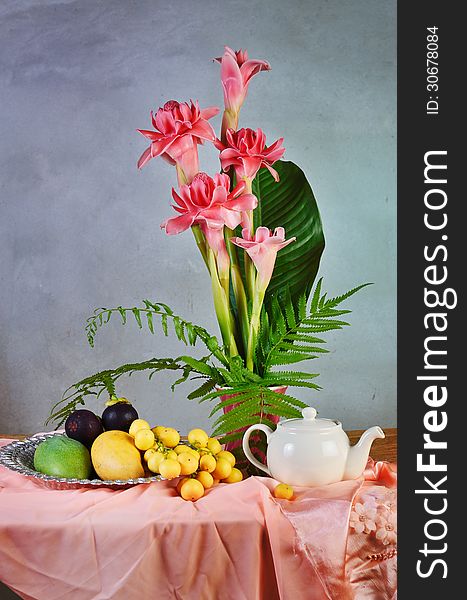 Tropical fruit and flowers composition in Still life concept. Tropical fruit and flowers composition in Still life concept