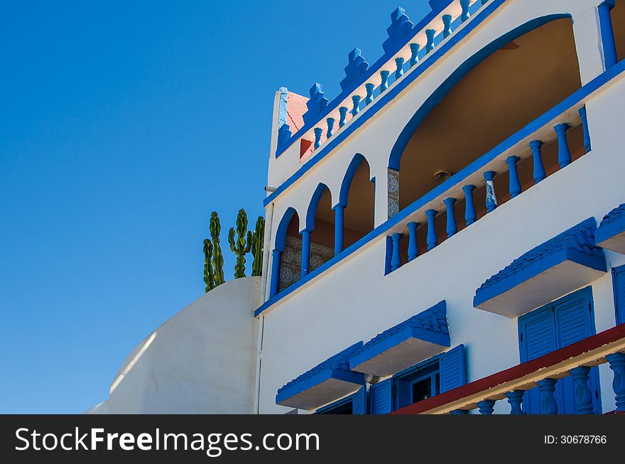 White and blue house on the ocean in Morocco. White and blue house on the ocean in Morocco