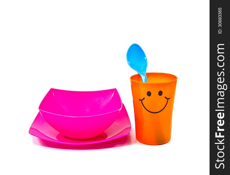 Bright plastic disposable tableware isolated on white background