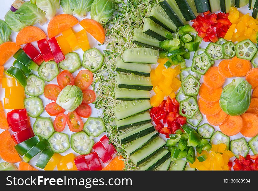 Assorted vegetables arrangement of carrot, cucumber, chili, onion