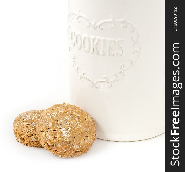 Oatmeal cookies and box on white background