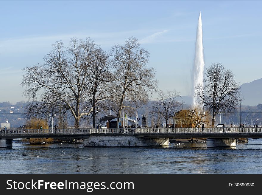 Geneva and the famous water jet in the lake Leman by a sunny winter day.