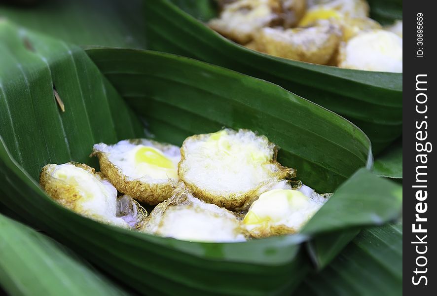 Quail eggs fried in banana leaf counts