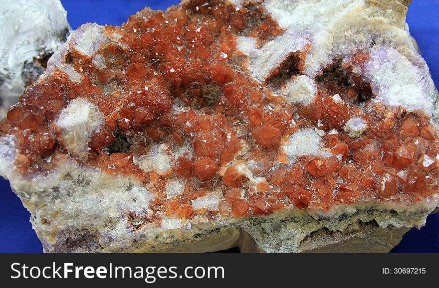 Many amethyst crystals on the rock