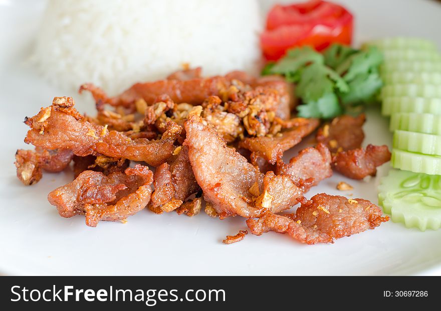 Thai food name fried pork with garlic and pepper