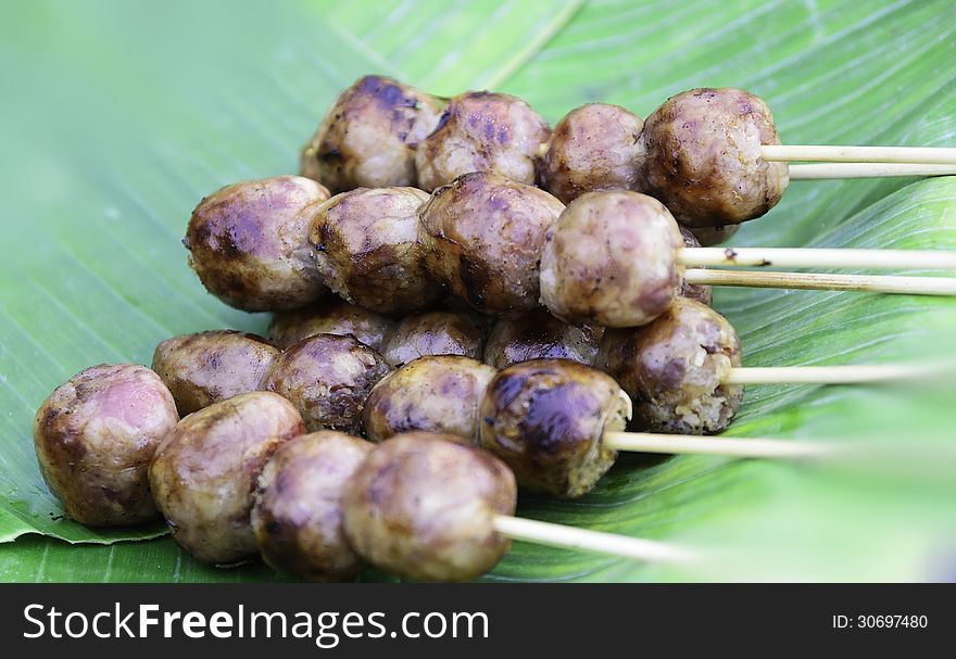 Sausage on a banana leaf in a restaurant