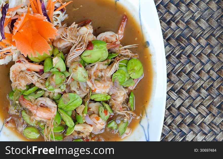 Thai food name Fried Parkia with shrimp and source.