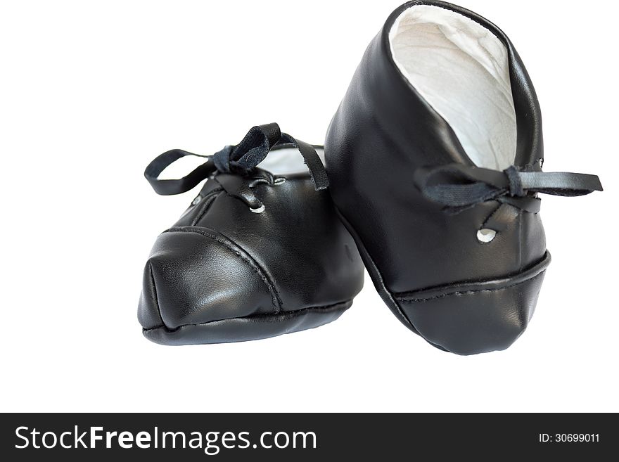 Black children's leather shoes on a white background. Black children's leather shoes on a white background
