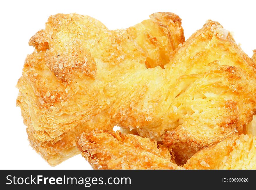 Delicious Puff Pastry Bakery Bows with Sugar Decoration closeup on white background