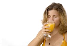 Girl Drinking Juice Isolated Royalty Free Stock Photography