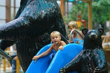 Boy Sliding In Water Park Stock Photography