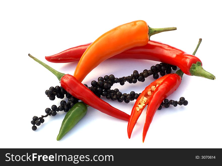 Isolated different kinds of pepper. Isolated different kinds of pepper.