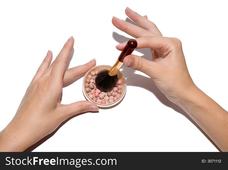 Girl's hands holding pink rouges. Girl's hands holding pink rouges