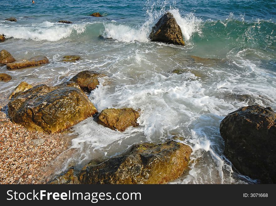 Sea and coast in  summer evening,  surf. Sea and coast in  summer evening,  surf