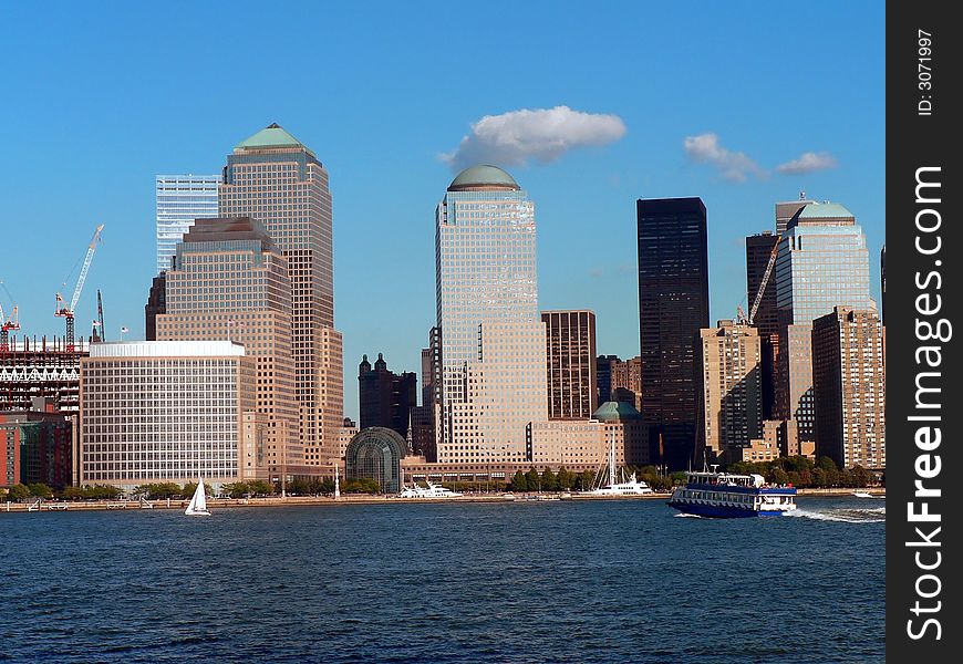 A view of Downton Manhattan's Financial District across the Hudson River. A view of Downton Manhattan's Financial District across the Hudson River