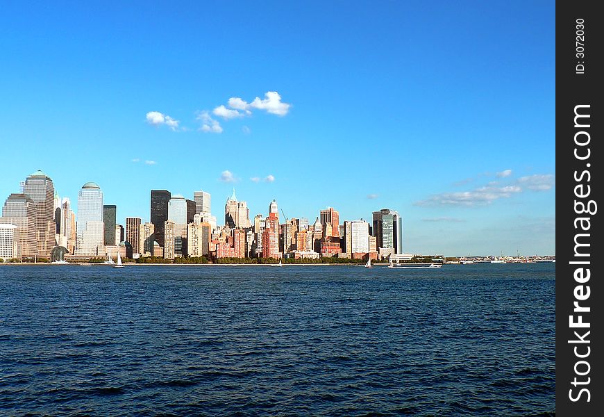 A view of Downton Manhattan's Financial District across the Hudson River. A view of Downton Manhattan's Financial District across the Hudson River