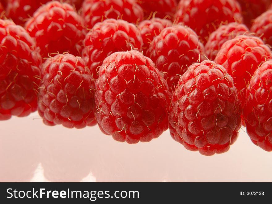 Crop red raspberries, close up. Crop red raspberries, close up