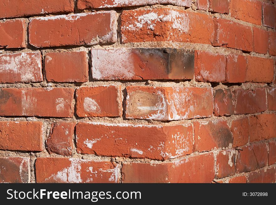 Ancient red bricks wall corner abstract texture background. Ancient red bricks wall corner abstract texture background