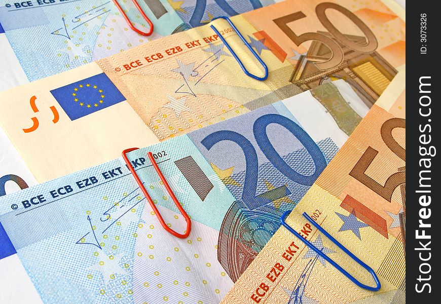 Twenty and Fifty Euro banknotes with shallow depth of field and focus on the 20