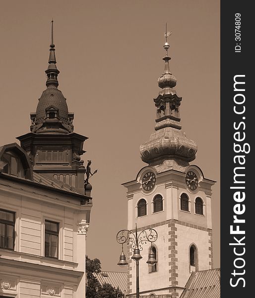 Two towers. Town of Banska Bystrica, Slovakia. Old photo style. Two towers. Town of Banska Bystrica, Slovakia. Old photo style.