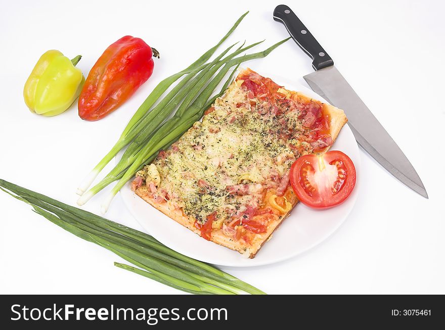 Salad, vegetables and pizza on a white background